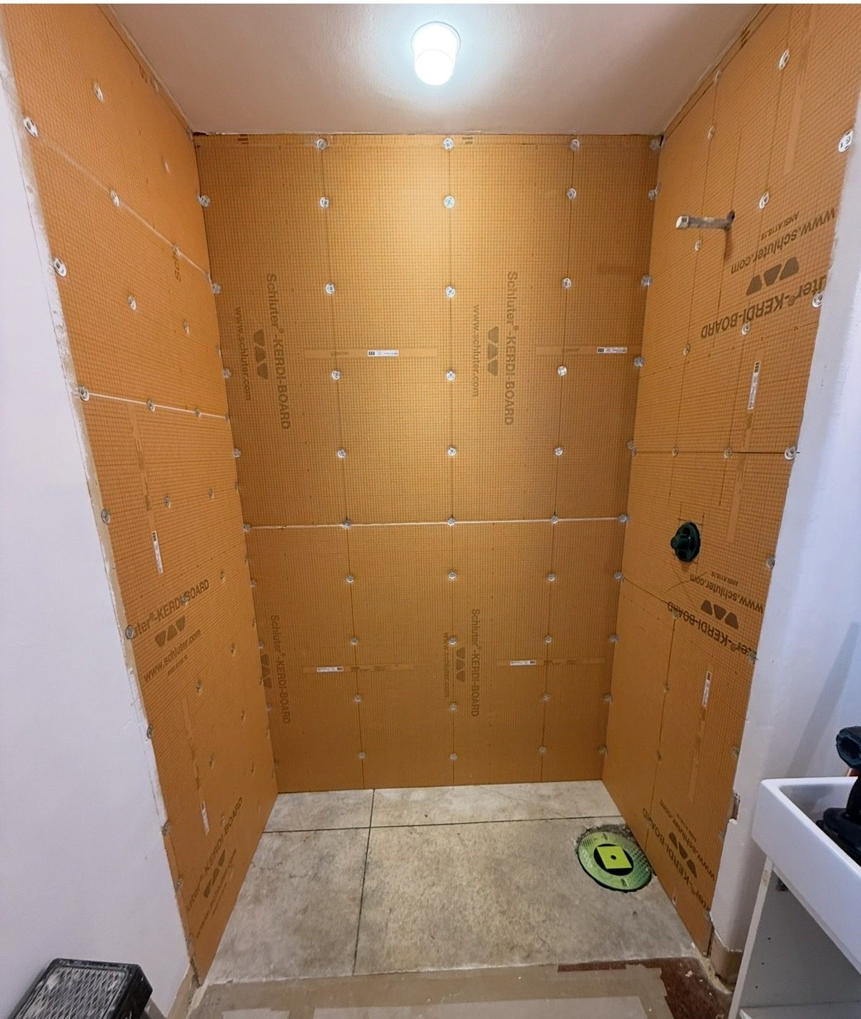 Waterproof board covering every shower wall
