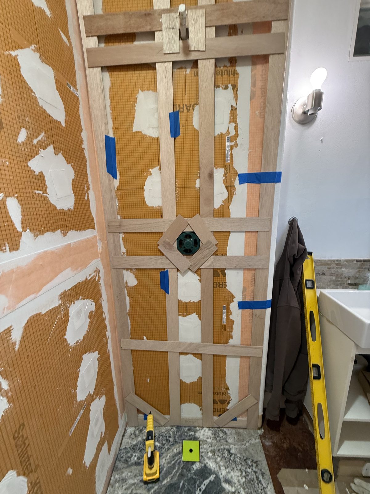Right wall template with the valve opening framed, base already installed